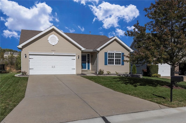 ranch-style house featuring a front lawn and a garage