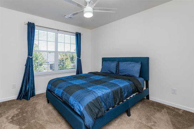 carpeted bedroom featuring ceiling fan