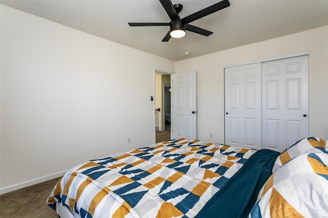 carpeted bedroom with a closet and ceiling fan