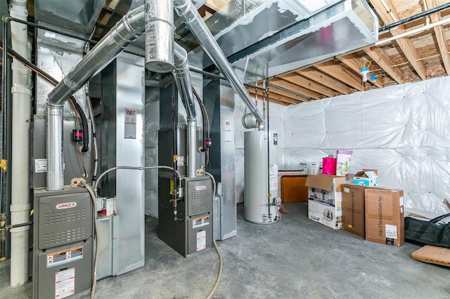 basement featuring water heater and heating unit