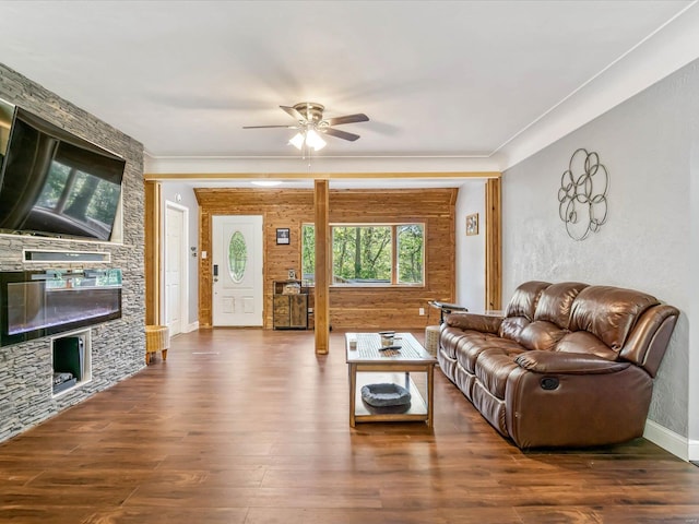 living room featuring dark hardwood / wood-style floors and ceiling fan