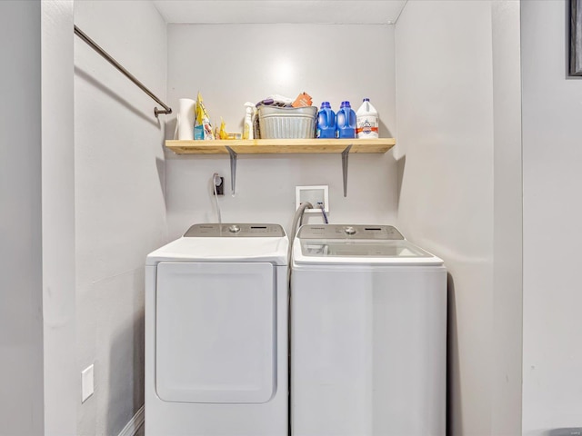 laundry room featuring washing machine and dryer