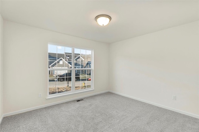 view of carpeted spare room