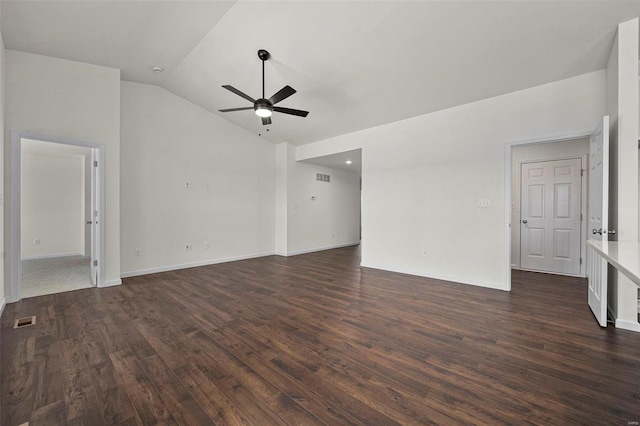 unfurnished living room featuring ceiling fan, vaulted ceiling, and dark hardwood / wood-style flooring