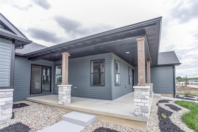 property entrance with a porch