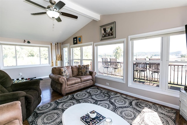 sunroom / solarium featuring ceiling fan, lofted ceiling with beams, and a wealth of natural light