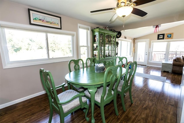 dining area with lofted ceiling, dark hardwood / wood-style floors, a wealth of natural light, and ceiling fan