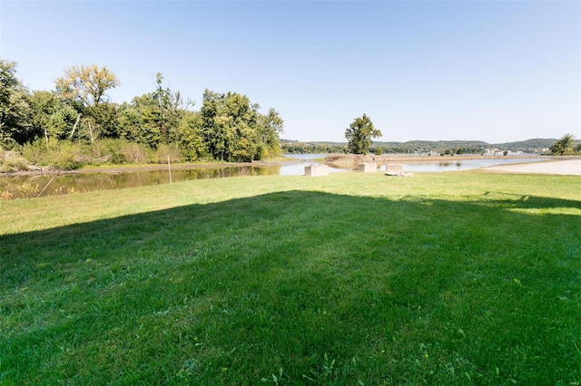 view of yard with a water view