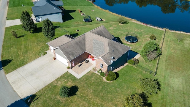 bird's eye view with a water view