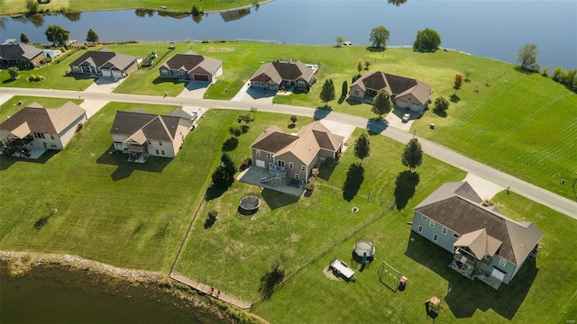 aerial view featuring a residential view and a water view