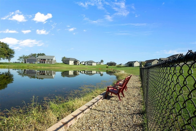 view of water feature featuring fence