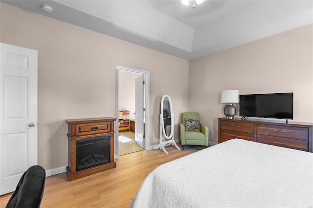 bedroom with light hardwood / wood-style flooring