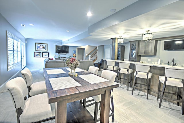 dining room featuring stairs, a chandelier, visible vents, and recessed lighting