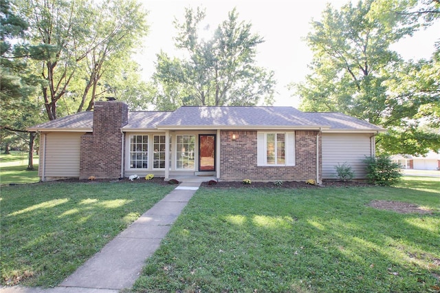 ranch-style house featuring a front yard