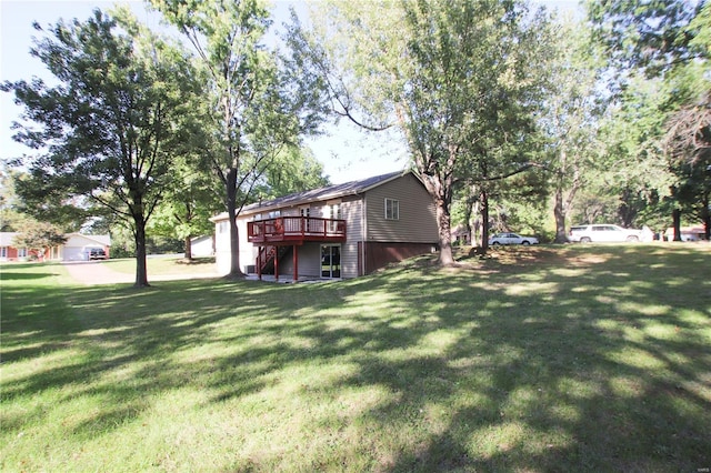 view of yard with a deck