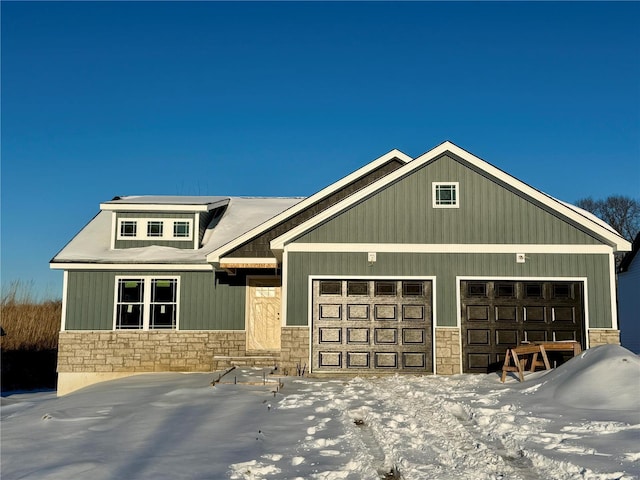 craftsman inspired home featuring a garage