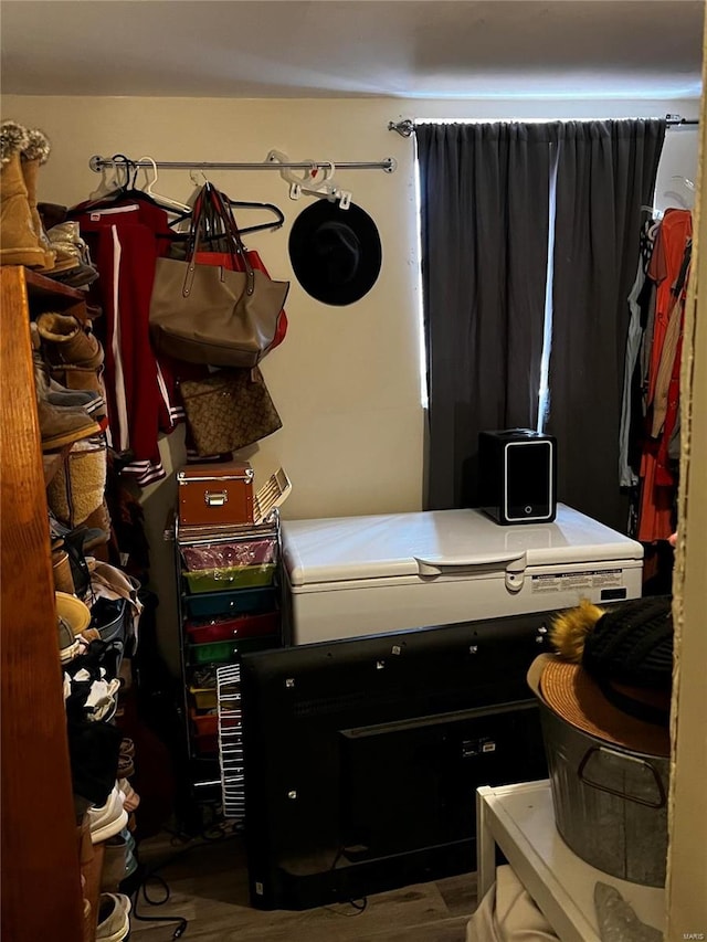 bedroom with hardwood / wood-style floors