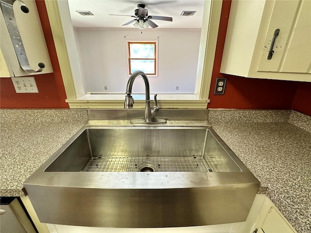 details with ceiling fan and sink