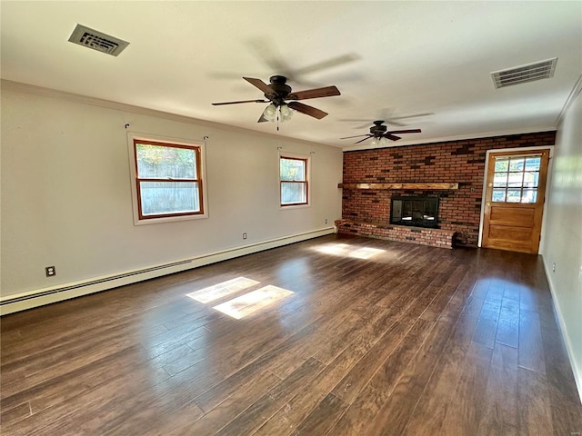 unfurnished living room featuring dark wood-type flooring, a brick fireplace, ceiling fan, ornamental molding, and a baseboard radiator