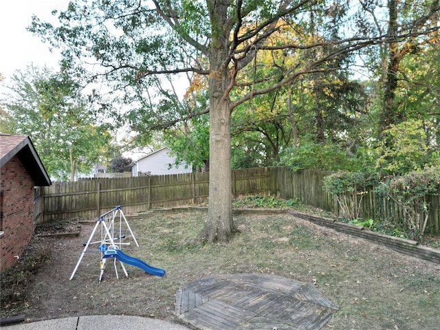 view of yard featuring a playground