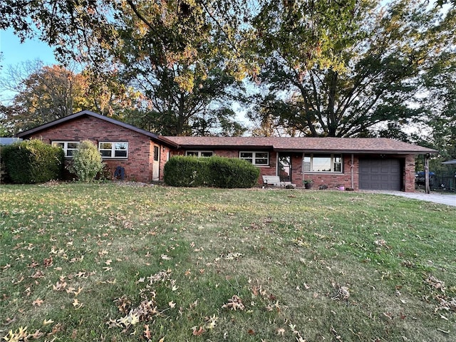 ranch-style house with a front yard and a garage