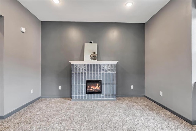 unfurnished living room with carpet