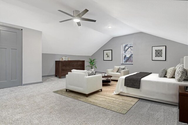 bedroom featuring ceiling fan, light colored carpet, and lofted ceiling