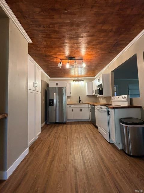 kitchen with white cabinetry, wood ceiling, stainless steel appliances, and dark wood-type flooring