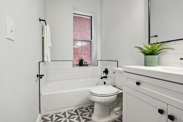 bathroom featuring a tub to relax in, tile patterned flooring, vanity, and toilet