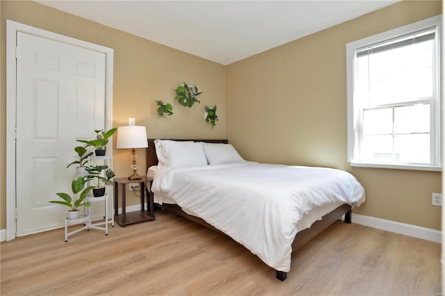 bedroom featuring light hardwood / wood-style floors