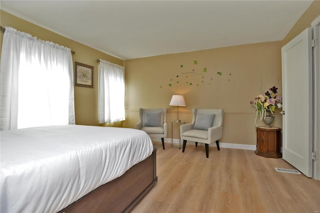 bedroom featuring light hardwood / wood-style flooring