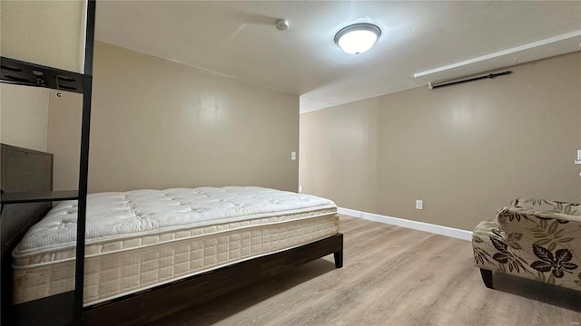 bedroom featuring light hardwood / wood-style flooring