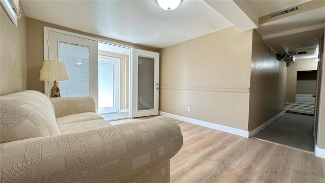 unfurnished living room featuring light hardwood / wood-style floors