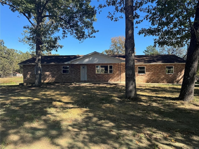 view of front of house with brick siding