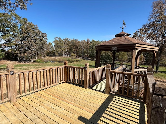 wooden deck featuring a gazebo