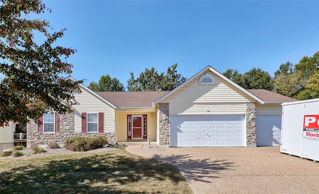 ranch-style house with a front yard and a garage