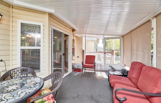 sunroom with vaulted ceiling