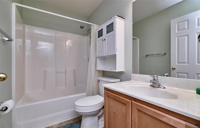 full bathroom featuring toilet, shower / bath combo with shower curtain, vanity, and tile patterned floors