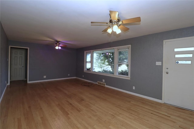 interior space featuring ceiling fan and light hardwood / wood-style flooring