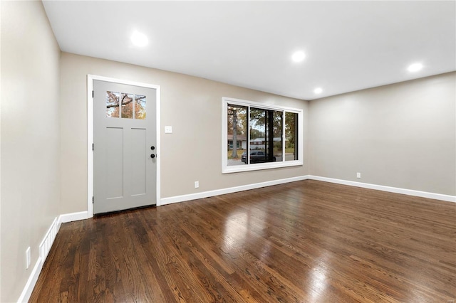 entrance foyer with dark hardwood / wood-style floors