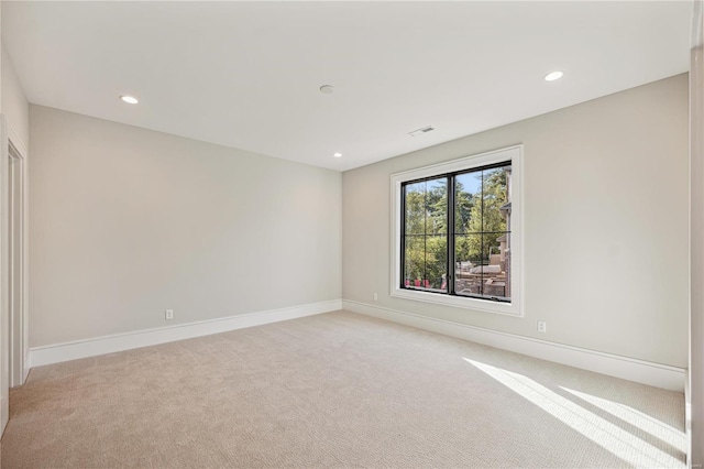 view of carpeted spare room