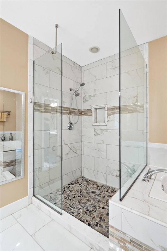 bathroom with independent shower and bath