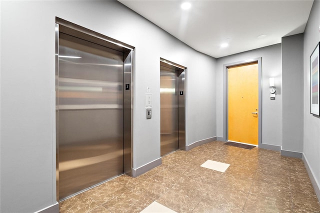 hallway featuring elevator