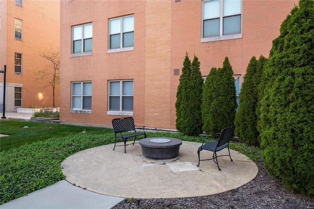 view of patio featuring an outdoor fire pit