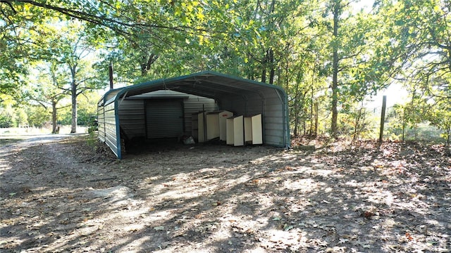 view of outdoor structure with a carport