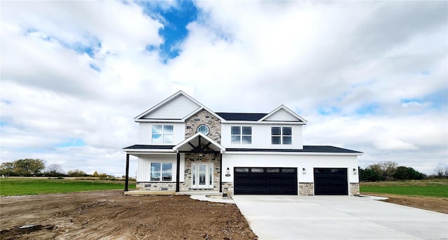 craftsman-style home with a garage and covered porch