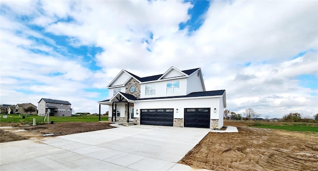 craftsman-style house featuring a garage