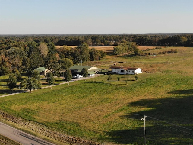 birds eye view of property featuring a rural view