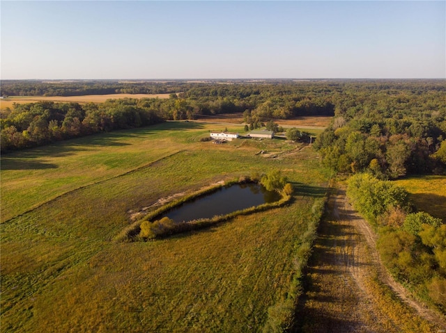 aerial view featuring a rural view and a water view