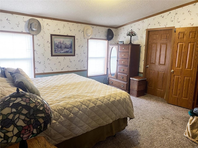 bedroom featuring vaulted ceiling, a textured ceiling, crown molding, and carpet flooring